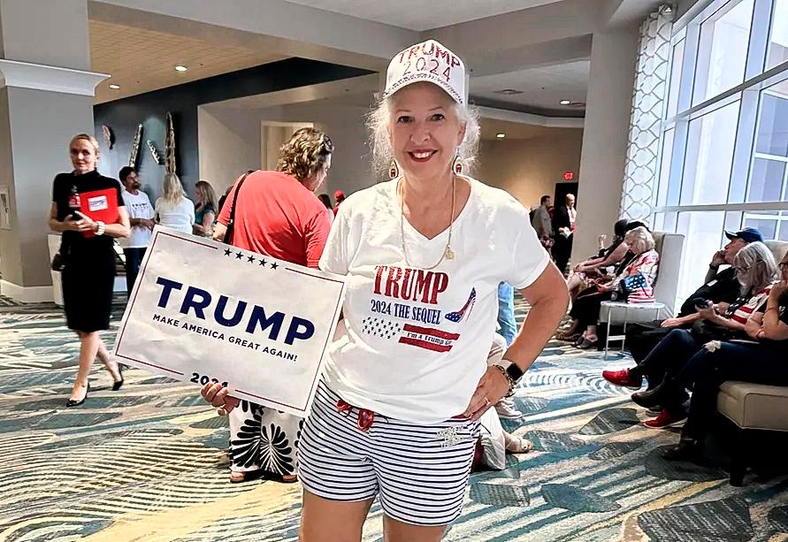 Debi Stolte of Altamonte Springs, Fla., stands outside a closed-door meeting of the Florida GOP's upper ranks on Sept. 15, 2023. (The Epoch Times)
