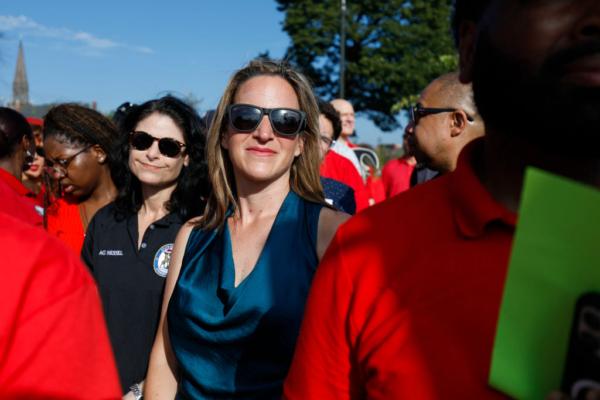 Michigan Secretary of State Jocelyn Benson (right) and Michigan Attorney General Dana Nessel (left) wait to speak at a United Auto Workers rally after the Detroit Labor Day Parade in Detroit, Mich., on Sept. 4, 2023. (Bill Pugliano/Getty Images)