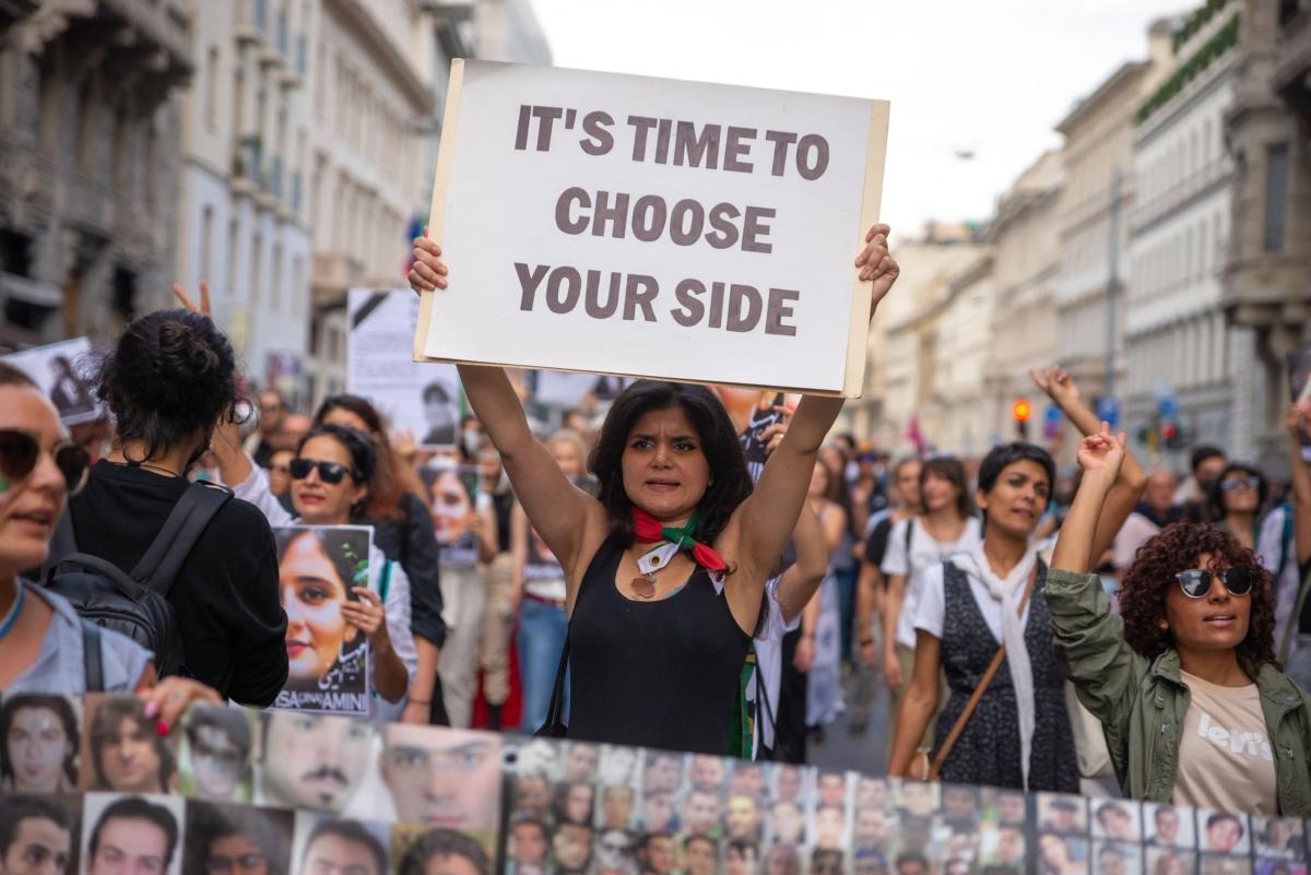 On the first anniversary of Mahsa Amini's death, Iranian people gathered in Milan to protest against the mandatory hijab on Sept. 16, 2023. (Davood Maeili/Middle East Images/AFP via Getty Images)