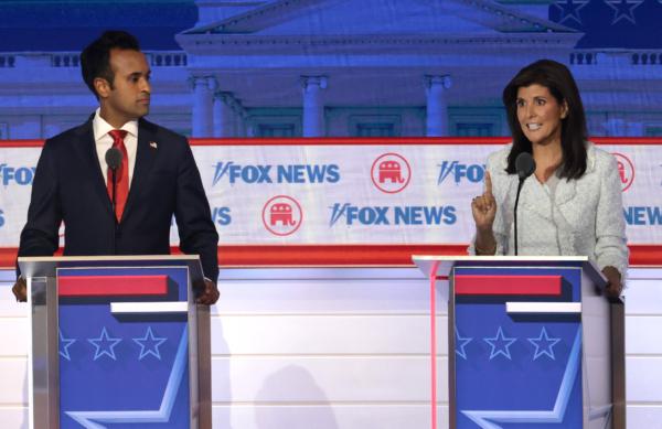 Republican presidential candidates Vivek Ramaswamy (L) and former U.N. Ambassador Nikki Haley participate in the first debate of the GOP primary season hosted by Fox News at the Fiserv Forum in Milwaukee on Aug. 23, 2023. (Win McNamee/Getty Images)