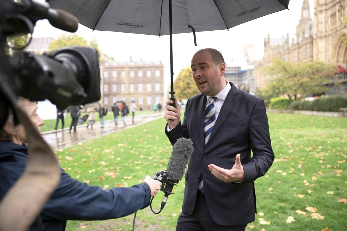 Richard Holden, Conservative MP for North West Durham, speaks to the press following the resignation of Liz Truss as prime minister, in London, on Oct. 20, 2022. (Dan Kitwood/Getty Images)