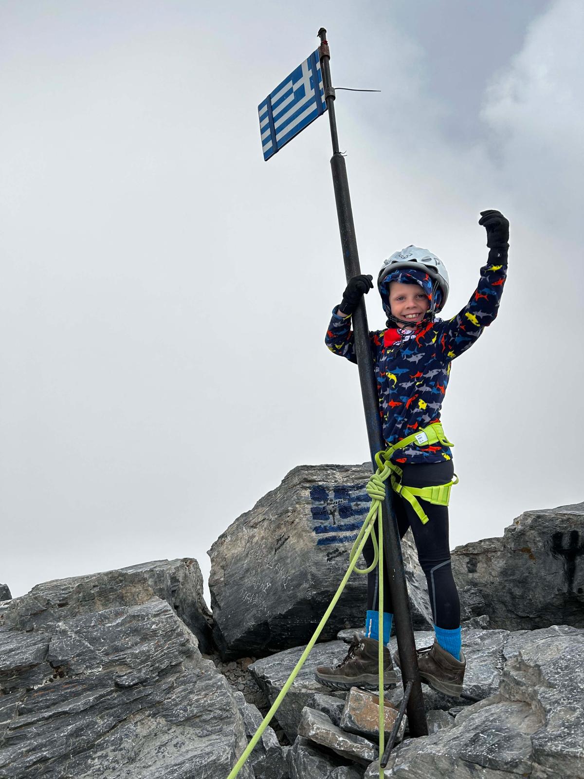 Frankie McMillan, 7, at the summit of Mount Olympus, Greece, in early September 2023. (SWNS)