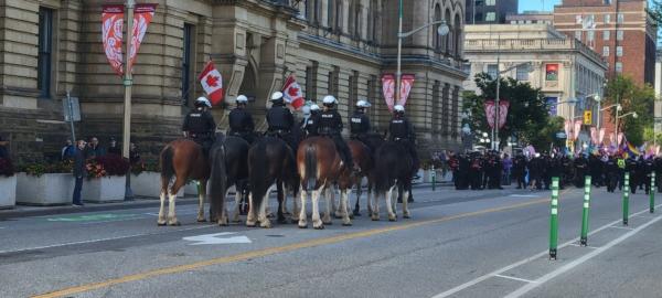 Mounted police are on standby in Ottawa as opposing groups face off on the issue of gender ideology in schools, Sept. 20, 2023. (Matthew Horwood/The Epoch Times)