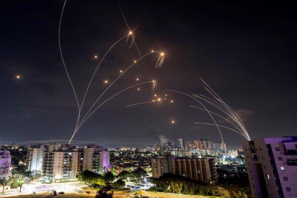 Israel's Iron Dome anti-missile system intercepts rockets launched from the Gaza Strip, as seen from Ashkelon in southern Israel, on Oct. 8, 2023. (Amir Cohen/Reuters)