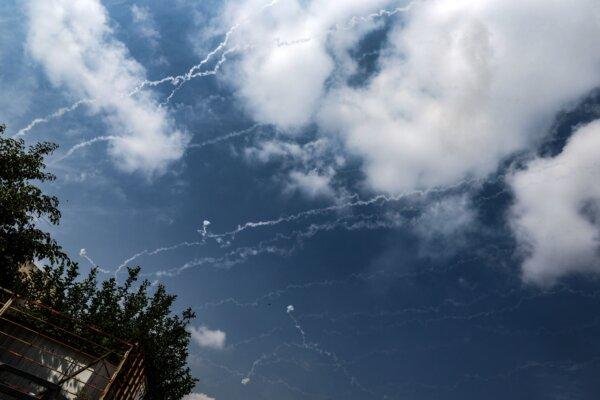 Rockets fired by Hamas terrorists in the Gaza Strip are intercepted by Israel's Iron Dome defense missile system over Sderot, Israel, on Oct. 8, 2023. (Jack Guez/AFP via Getty Images)