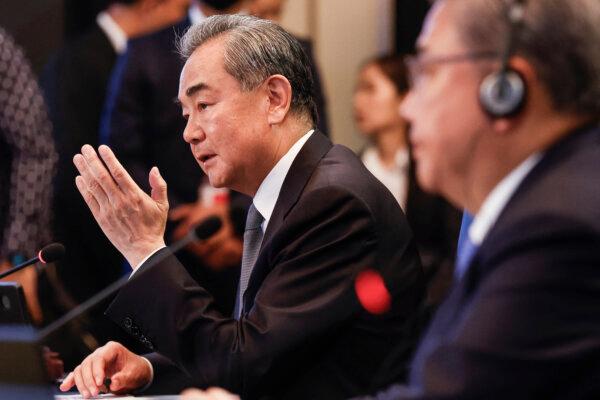 Chinese Foreign Minister Wang Yi (L) speaks as South Korea's Foreign Minister Park Jin looks on during the Association of Southeast Asian Nations (ASEAN) Plus Three Foreign Ministers' Meeting in Jakarta on July 13, 2023. (Mast Irham/Pool/AFP via Getty Images)