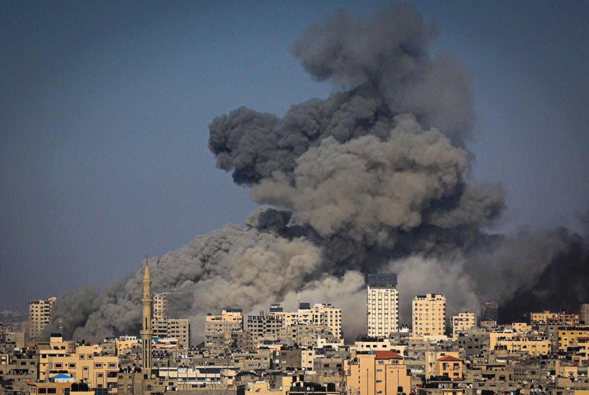 Smoke billows during Israeli air strikes in Gaza City as raging battles between Israel and Hamas continue for the sixth consecutive day, on Oct. 12, 2023 . (Mahmud Hams/AFP via Getty Images)
