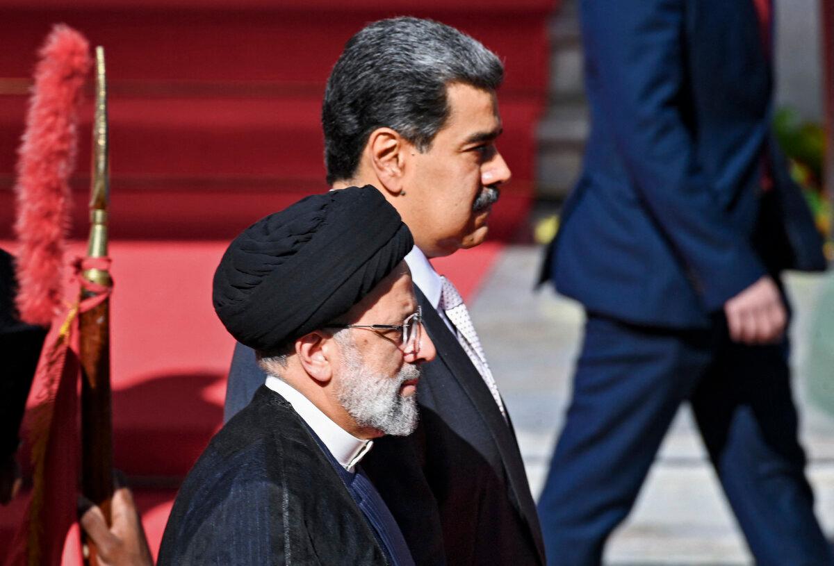 Iranian President Ebrahim Raisi (front) meets with Venezuelan leader Nicolas Maduro at Miraflores Presidential Palace in Caracas, on June 12, 2023. (Yuri Cortez/AFP via Getty Images)