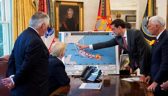 U.S. President Donald Trump is seen in an official White House handout photo with U.S. Secretary of State Rex Tillerson (L), Homeland Security and Counterterrorism Adviser Thomas Bossert (2ndR) and Vice President Mike Pence (R) as he participates in an Oval Office briefing tracking the approach of Hurricane Irma toward the coast of Florida, at the White House in Washington, U.S., September 7, 2017. (Andrea Hanks/Courtesy of the White House/Handout via Reuters)