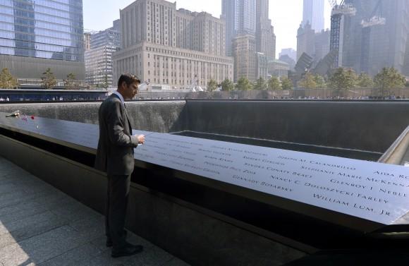 Architect Michael Arad, who designed the 9/11 Memorial, looks over the North Pool during ceremonies for the 12th anniversary of the terrorist attacks on the World Trade Center site on Sept. 11, 2013 in New York City. (Justin Lane-Pool/Getty Images)