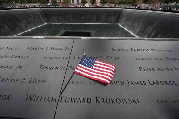 The memorial wall on the South Tower reflecting pool of the World Trade Center September 11, 2011 in New York. (Don Emmert/AFP/Getty Images)