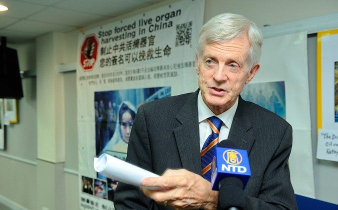 David Kilgour meets the press after giving a talk at the Theater of the Federation of Medical Societies in Hong Kong on July 20, 2013. (Epoch Times)