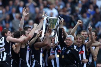The Magpies hold up the Premiership Cup after the Magpies won the AFL Grand Final Replay match between the Collingwood Magpies and the St Kilda Saints at Melbourne Cricket Ground on Oct. 2. (Quinn Rooney/Getty Images) The Magpies hold up the Premiership Cup after the Magpies won the AFL Grand Final Replay match between the Collingwood Magpies and the St Kilda Saints at Melbourne Cricket Ground on Oct. 2. (Quinn Rooney/Getty Images)