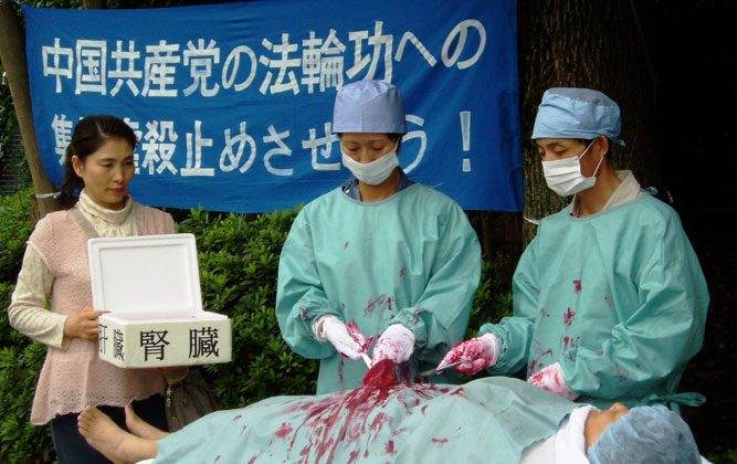 CHINA makes millions cutting up live
                          prisoners, selling their organs.