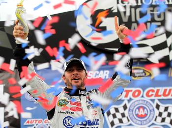 #48 WINS 48: Jimmie Johnson celebrates in victory lane after winning the NASCAR Sprint Cup Series Auto Club 500 at Auto Club Speedway at Fontana, California. (Jason Smith/Getty Images for NASCAR) #48 WINS 48: Jimmie Johnson celebrates in victory lane after winning the NASCAR Sprint Cup Series Auto Club 500 at Auto Club Speedway at Fontana, California. (Jason Smith/Getty Images for NASCAR)