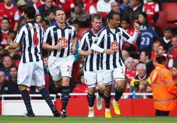 WEST BROM CELEBRATES: Peter Odemwingie (R) showed skill and strength in giving the Arsenal defense fits. (Julian Finney/Getty Images) WEST BROM CELEBRATES: Peter Odemwingie (R) showed skill and strength in giving the Arsenal defense fits. (Julian Finney/Getty Images)