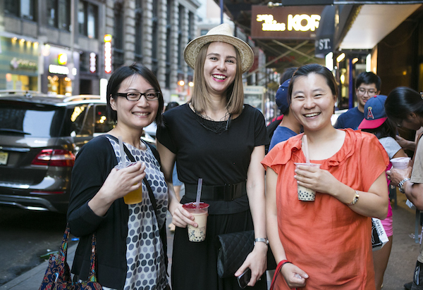 (L–R) Anna Takaoka, Maria Zyablitskaya, and Suyouyang Kim sip bubble tea from Gong Cha. (Samira Bouaou/Epoch Times)