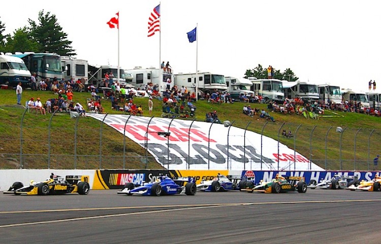 Dario Franchitti leads the field at the start of the IndyCar race in Loudon, New Hampshire.  (Chris Jones/Indycar.com)