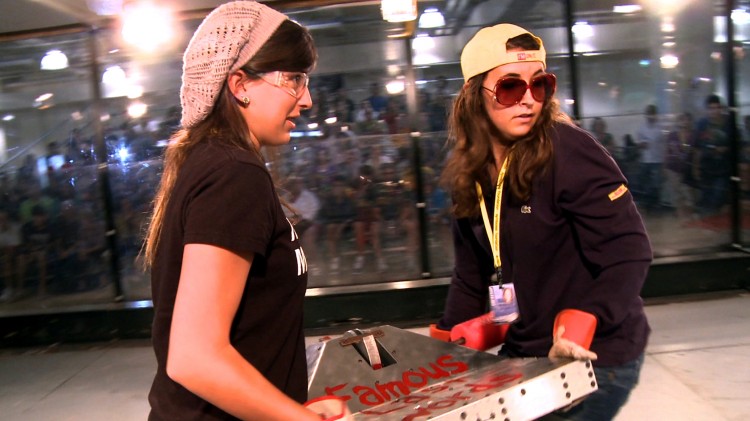 Camilla and Elizabeth load their robot Famous Last Words into the arena for battle, in the 'Bots High' documentary. (Courtesy of Joey Daoud)