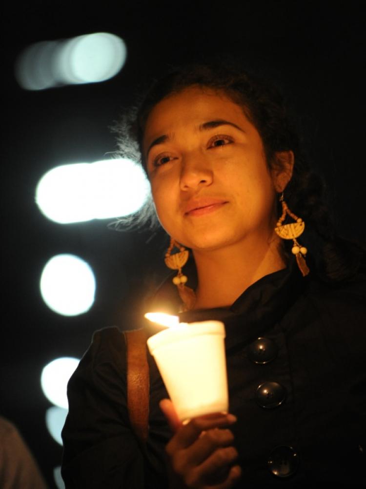 Mexican and Latino janitors hold a candlelight vigil calling for federal immigration reform, in response to the tough new Arizona law giving the police new stop and search powers, outside their place of work in Los Angeles on May 20, 2010.  (Mark Ralston/AFP/Getty Images)