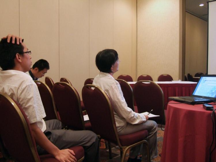 Cheng Ningning (right), Wang Wenzhong (center), along with a Washington DC Chinese Consulate employee (left) appeared at the ICSA conference on July 1.  (The Epoch Times)