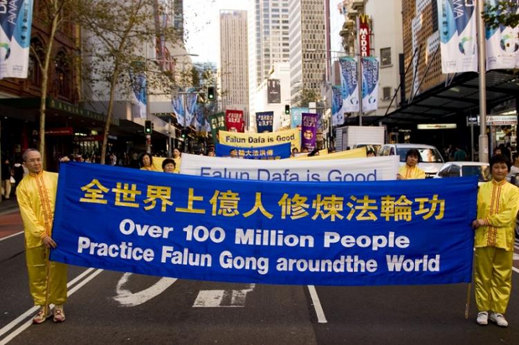 Falun Gong practitioners' 11 years of perseverance is to help people discover the truth.  (The Epoch Times)