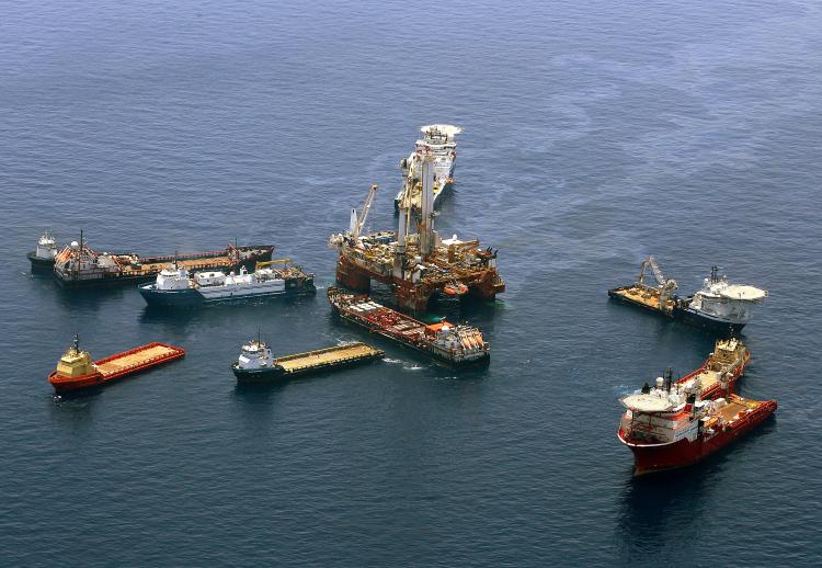 Crews on ships work on the attempted 'top kill' procedure at the source site of the Deepwater Horizon disaster on May 29, 2010 in the Gulf of Mexico near Venice, Louisiana.  (Win McNamee/Getty Images)