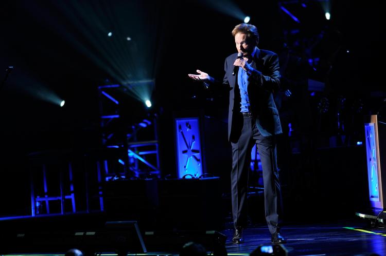 Comedian Conan O'Brien performs at Radio City Music Hall for the Conan O'Brien's 'Legally Prohibited From Being Funny On Television' Tour on June 1, 2010 in New York City. (Jemal Countess/Getty Images)