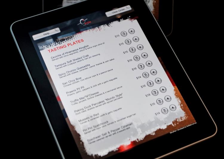 Apple touchscreen iPad tablet showing the menu screen, is displayed at the Global Mundo Tapas eatery at the Rydges Hotel in North Sydney on June 4. (Greg Wood/AFP/Getty Images)