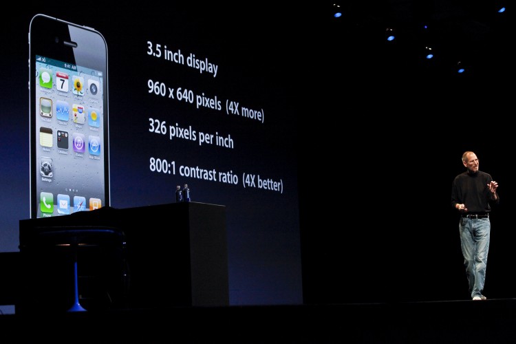 Apple will announce the Apple iCloud service at this year's WWDC event. In this file photo, Apple chief executive Steve Jobs introduces the iPhone 4 during a WWDC keynote speech. (Ryan Anson/AFP/Getty Images)