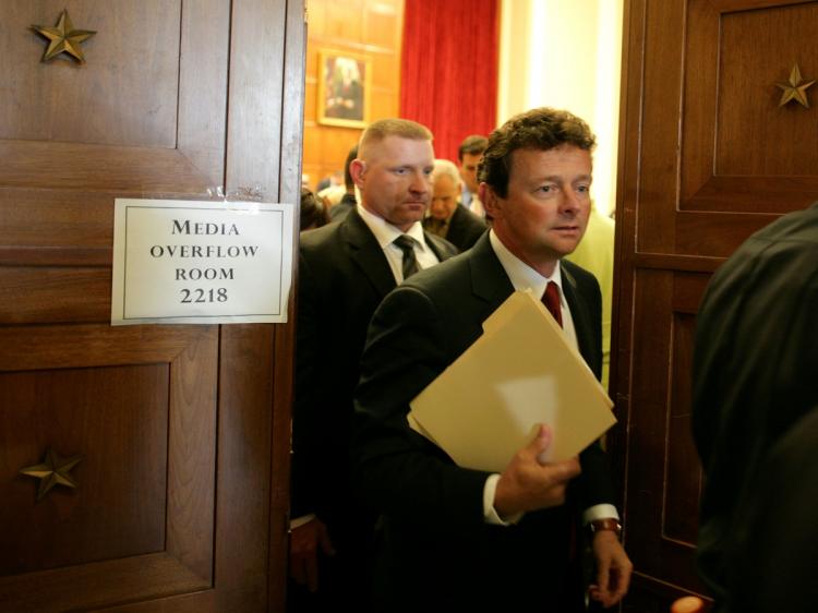 BP chief Tony Hayward departs a House Oversight and Investigations Subcommittee hearing on 'The Role Of BP In The Deepwater Horizon Explosion And Oil Spill' at the Rayburn House Office Building on Capitol Hill in Washington, DC, June 17, 2010. Under fire for the Gulf of Mexico oil spill, Hayward coolly told angry US lawmakers he was 'not a cement engineer,' 'not an oceanographic scientist,' and not in the loop. (Chris Kleponis/AFP/Getty Images)