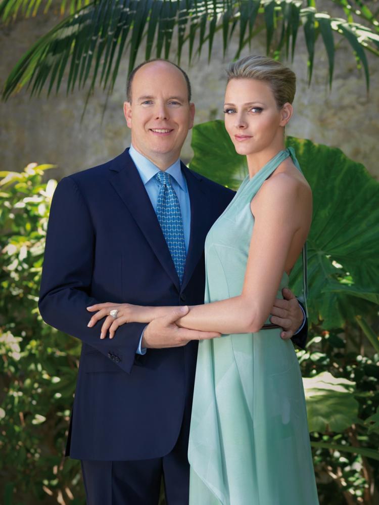 In this handout image provided by the Palais Princier Monaco, Prince Albert II of Monaco poses with his fiancee Charlene Wittstock on the announcement of their engagement at the Palais de Monaco.  (Amedeo M.Turello/Palais Princier Monaco via Getty Images)