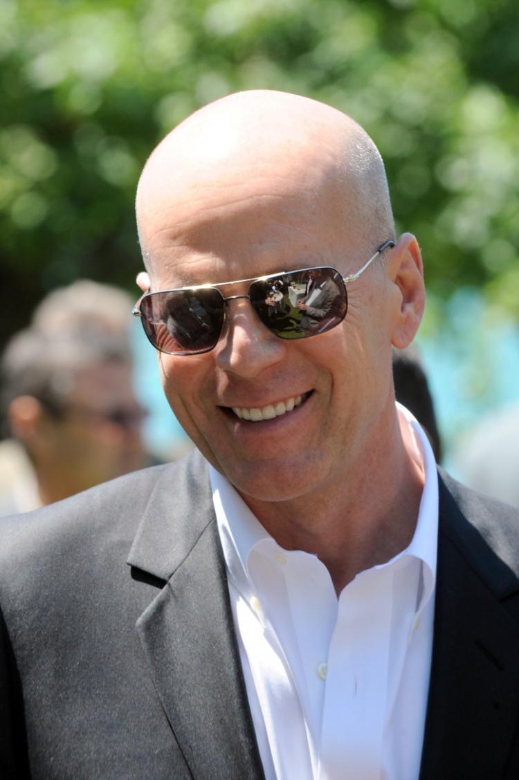 US actor Bruce Willis, shareholder of the French Belvedere Group, arrives to attend the general assembly of the wine and spirit company on June 25, 2010 in Talloires, eastern France. (Jean-Pierre Clatot/AFP/Getty Images)