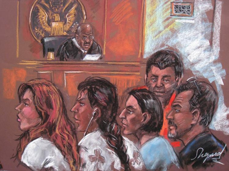 This drawing dated June 28, shows five of the 10 arrested Russian spy suspects in a New York courtroom. The US cracked open on Monday an alleged Russian spy ring.  (Shirley Shepard/Getty Images)