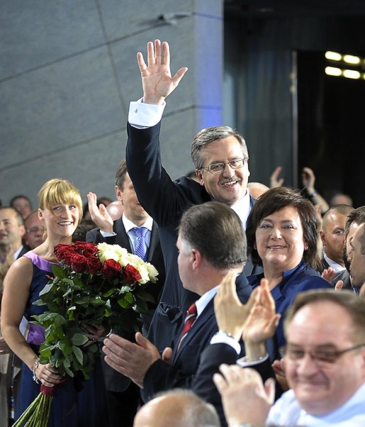 Close call: New Polish President Bronislaw Komorowski  reacts after exit polls for the early presidential elections in Warsaw on July 4. The polls show Komorowski won by a very narrow victory.  ( Janek Skarzynski/Getty Images )
