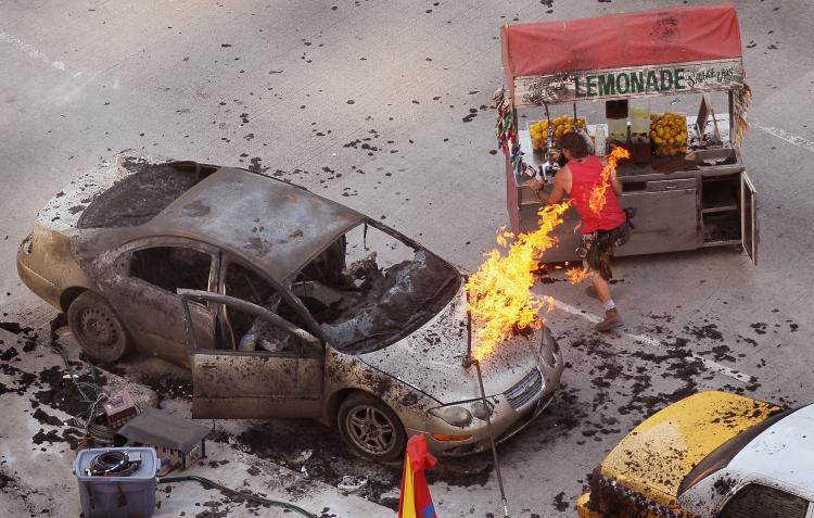 Workers stage a disaster area along Michigan Avenue near the Chicago River bridge during the filming of the movie Transformers 3 in Chicago, Illinois. (Scott Olson/Getty Images)