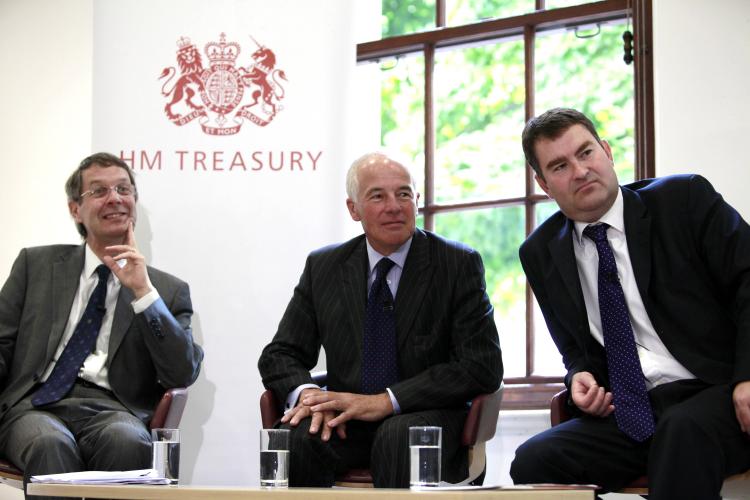 John Whiting (L), of the Chartered Institute of Taxation, Michael Jack (C), former UK treasury minister and David Gauke (R) UK exchequer secretary to the treasury, at HM Treasury July 20, in London, England. A tax blunder by HM Revenue will affect over 5.5 million, 1.4 million adversely.