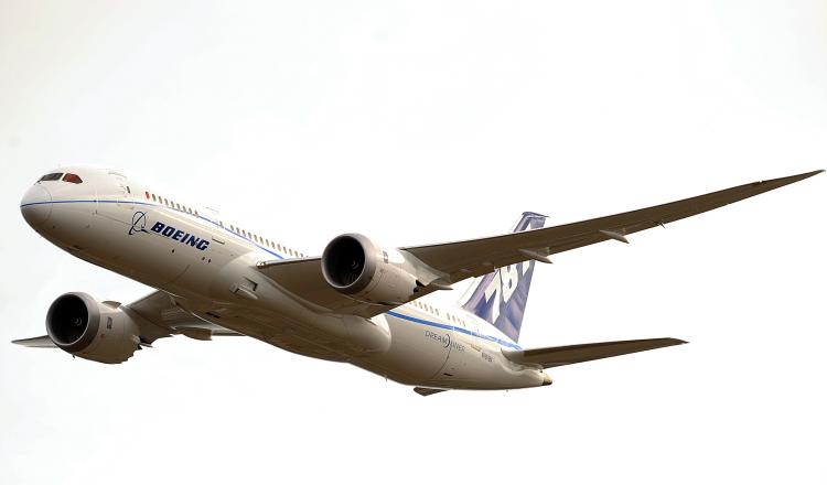 GROUNDED: A Boeing 787 Dreamliner aircraft does a flyby at the Farnborough Airshow in England this summer. A new delay in test flights for the 787 aircraft may cause Boeing to further delay deployment of the much-anticipated aircraft.