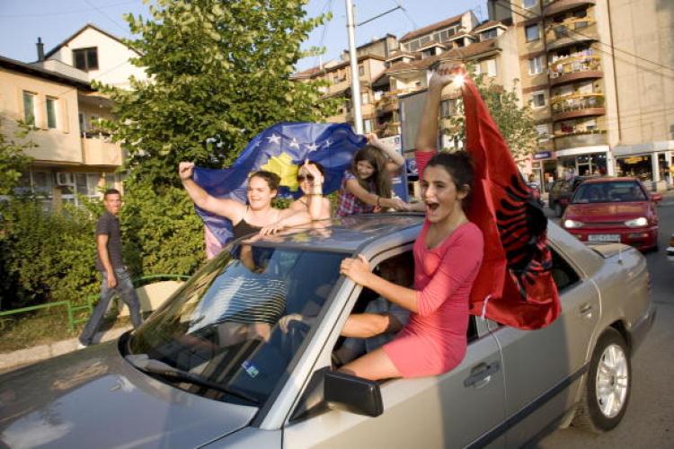 RELIEF: Kosovo Albanians celebrate in the city of Mitrovica, Kosovo, following a decision by the United Nations-led International Court of Justice, that Kosovo's declaration of independence from Serbia is legal.  (Laura Serbia/Getty Images)