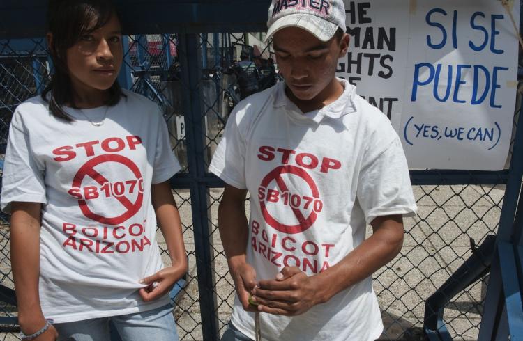 Mexican citizens protest in front of the U.S. embassy in Mexico City against Arizona's new immigration law (SB 1070), on July 28.   (Omar torres/Getty Images)