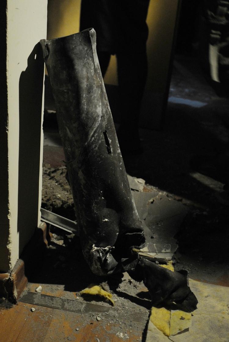 A rocket fired from the Gaza Strip on the Israeli town of Sderot causes damages on late on July 31, following an Israeli airstrikes on the Gaza Strip killing a senior militant and wounded eight other people. (David Buimovitch/AFP/Getty Images)