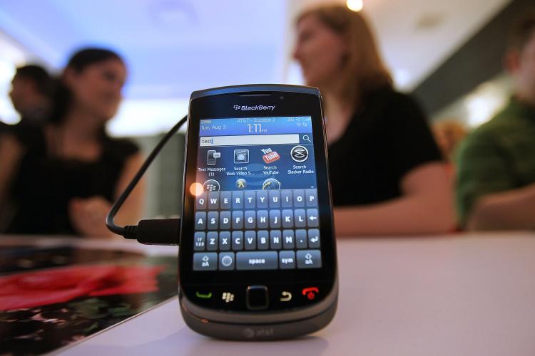 The new Blackberry Torch 9800 smartphone is seen after being unveiled at a news conference August 3, in New York City. (Mario Tama/Getty Images)