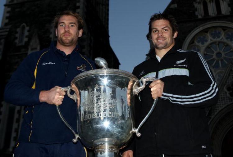 All Black captain Richie McCaw (R) and Australian Wallabies captain Rocky Elsom (L) pose with the Bledisloe Cup in Cathedral Square.  (Phil Walter/Getty Images)
