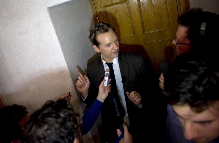 Wikileaks founder Julian Assange is interviewed by media during a seminar at the Swedish Trade Union Confederation headquarters in Stockholm on Aug. 14. (Bertil Ericson/AFP/Getty Images)