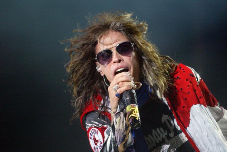 Steven Tyler of Aerosmith performs at Fenway Park on August 14, 2010 in Boston, Massachusetts. (John W. Ferguson/Getty Images)