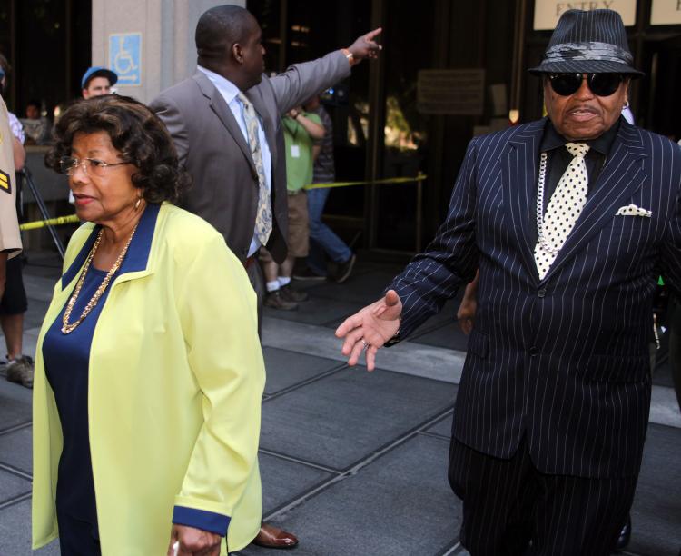 Katherine Jackson (L) and Joe Jackson leave the preliminary hearing for Dr. Conrad Murray at the Los Angeles courthouse on Aug. 23. Now the family is sueing event organisers AEG live for negligence. (Frederick M. Brown/Getty Images)