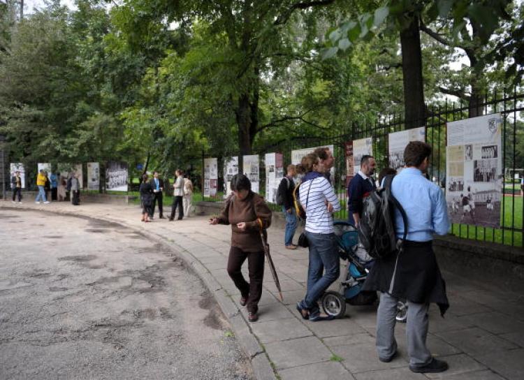 People look at an open-air exhibition Aug. 18, 2010; the photographs detailing the largely-forgotten sporting life of Warsaw's then-vibrant Jewish community before World War II in Warsaw.  (Janek Skarzynski/AFP/Getty Images)