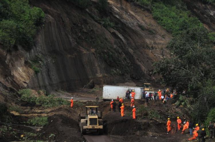 View of a site where at least 20 people were buried by a landslide in the Nahuala municipality, Solola, west of Guatemala City, on September 5, 2010.  (Johan Ordonez/AFP/Getty Images )