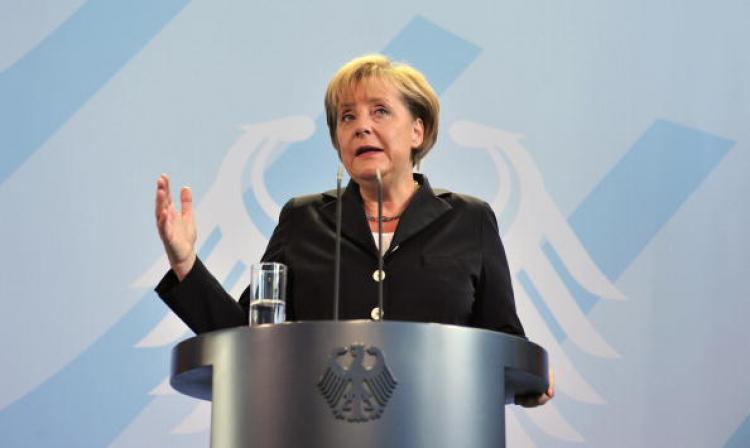 German Chancellor Angela Merkel addresses a press conference at the chancellery September 6, following her government's decision to extend the life of the country's nuclear plants.   (John Macdougall/Getty Images)