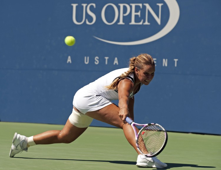Dominika Cibulkova of Slovakia chases down a return during her win over number 11 seeded Svetlana Kuznetsova of Russia at the US Open 2010 tennis tournament at the USTA Billie Jean King National Tennis Center September 6, 2010 in New York City. (DON EMMERT/AFP/Getty Images)